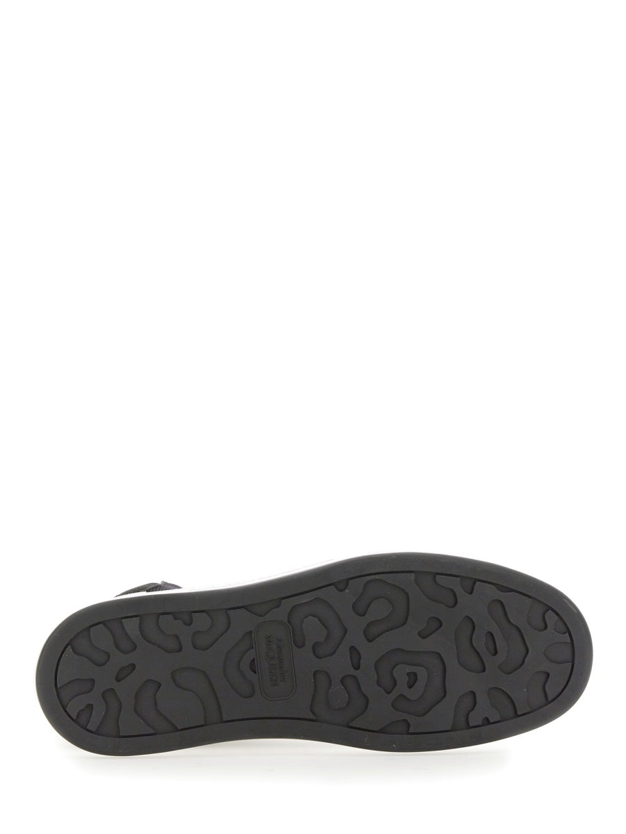 Close-up of Alexander McQueen athletic hardware and fine stitching