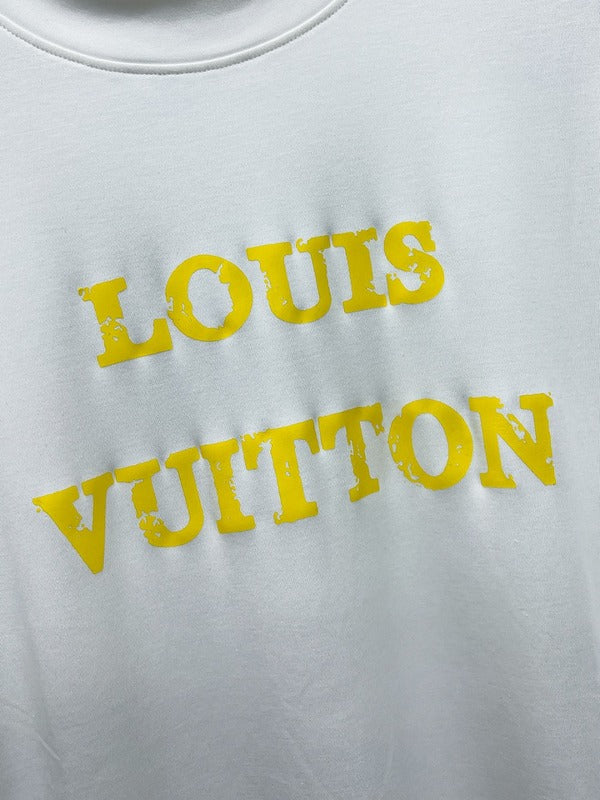 Flat lay presentation of Louis Vuitton luxury clothing with streetwear-inspired cut