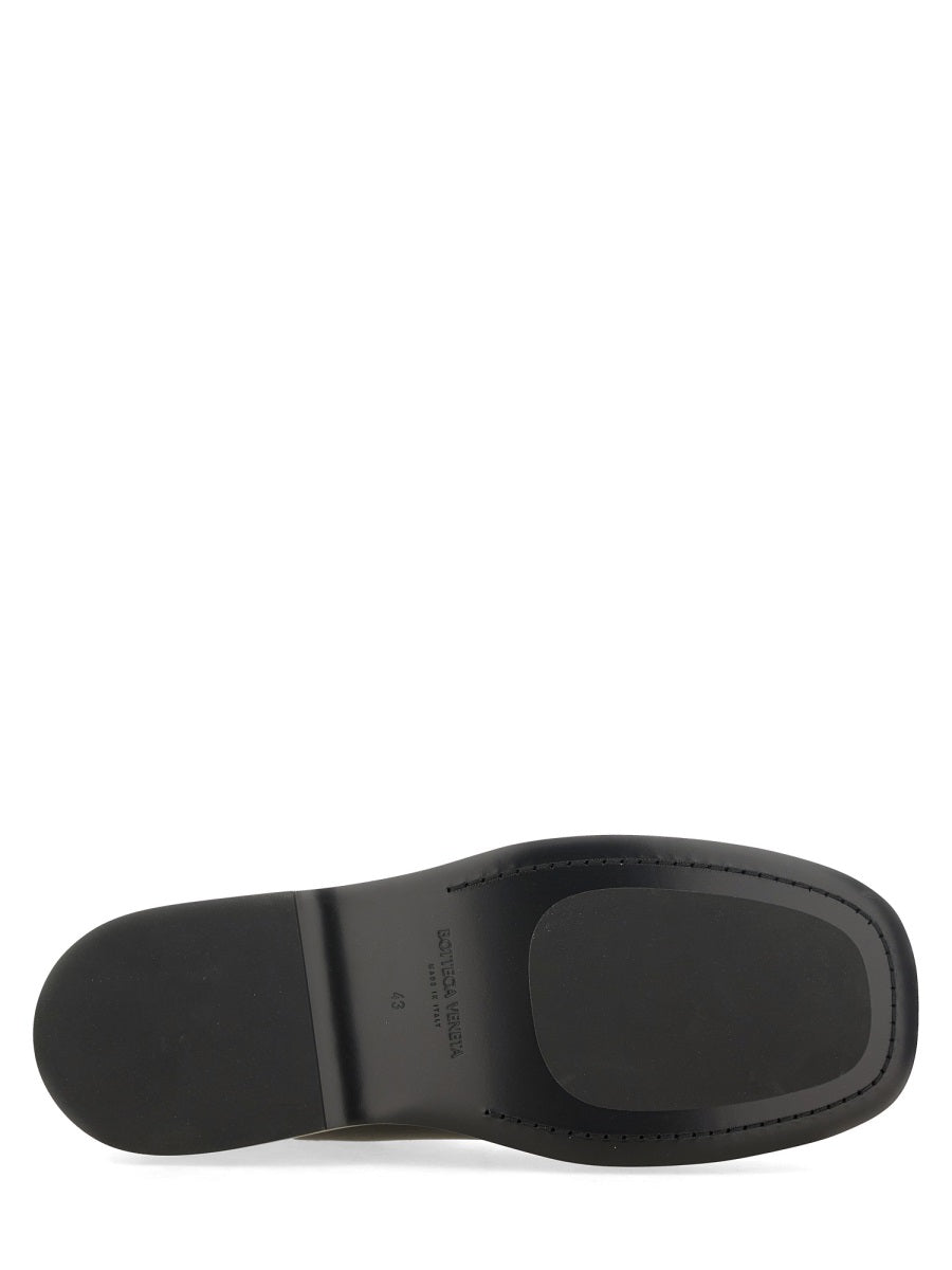 Close-up of Bottega Veneta boots & booties hardware and fine stitching