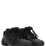 Alexander McQueen athletic side profile designer luxury fashion
