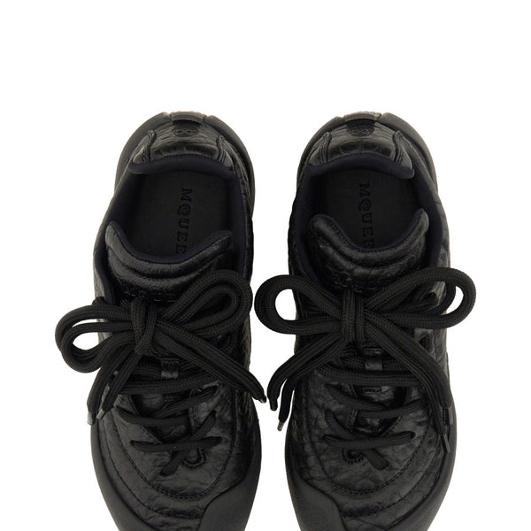 Alexander McQueen premium athletic detail and craftsmanship close-up