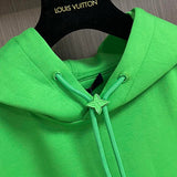 Close-up detail shot of Louis Vuitton luxury clothing with logo-detail design