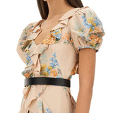 Close-up of Alexander McQueen cocktail dresses hardware and fine stitching