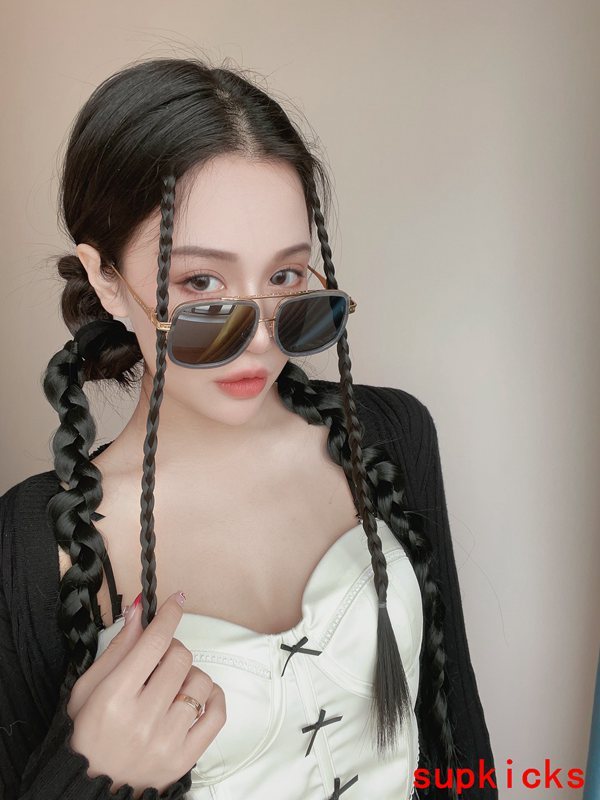 Lifestyle view of Louis Vuitton unisex sunglasses