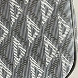 Back view of sleek polished women's handbag – women's luxury accessory