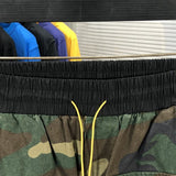 Close-up detail shot of Rhude luxury clothing with streetwear-inspired cut