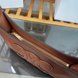 Side profile of sleek refined women's handbag – women's luxury handbag