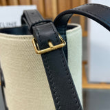 Side profile of chic premium women's handbag – women's statement bag