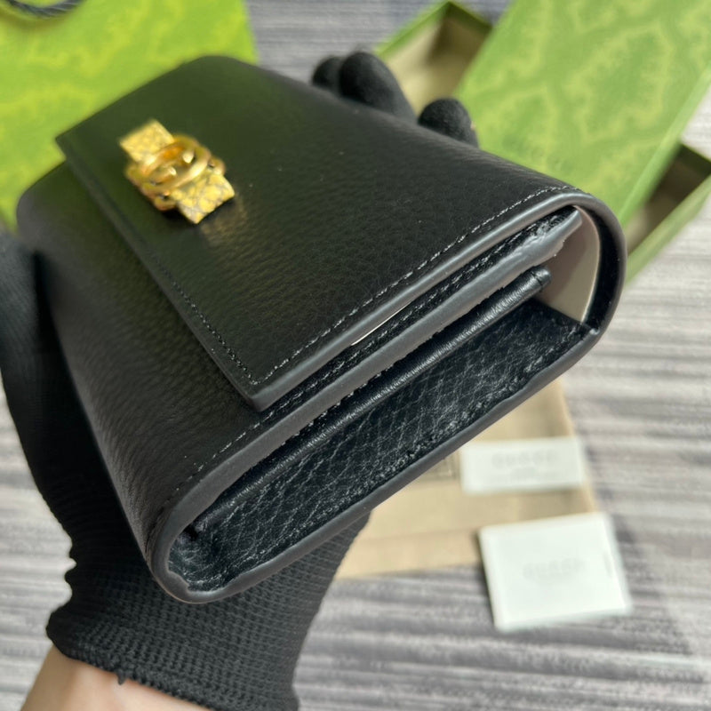 Back view of sleek refined women's handbag – women's statement bag