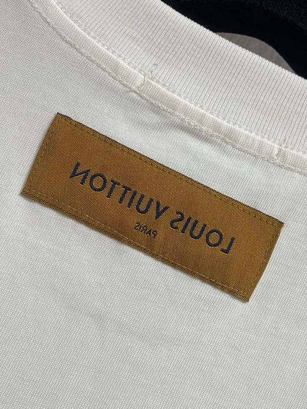 Close-up detail shot of Louis Vuitton cotton t-shirt with logo-detail design