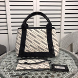 Front view of refined classic women's handbag – women's premium purse