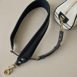 Handle and strap detail of signature everyday-luxe women's handbag – women's designer-style accessory