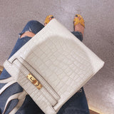Sculpted handbag styled for everyday wear