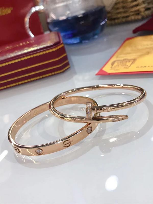 Front view of Cartier unisex jewelry piece