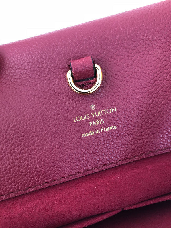 Side profile of chic elevated women's handbag – women's luxury accessory