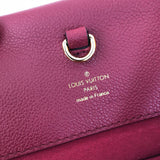 Side profile of chic elevated women's handbag – women's luxury accessory