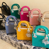 Styled lifestyle shot of everyday-luxe structured women's handbag – women's everyday handbag