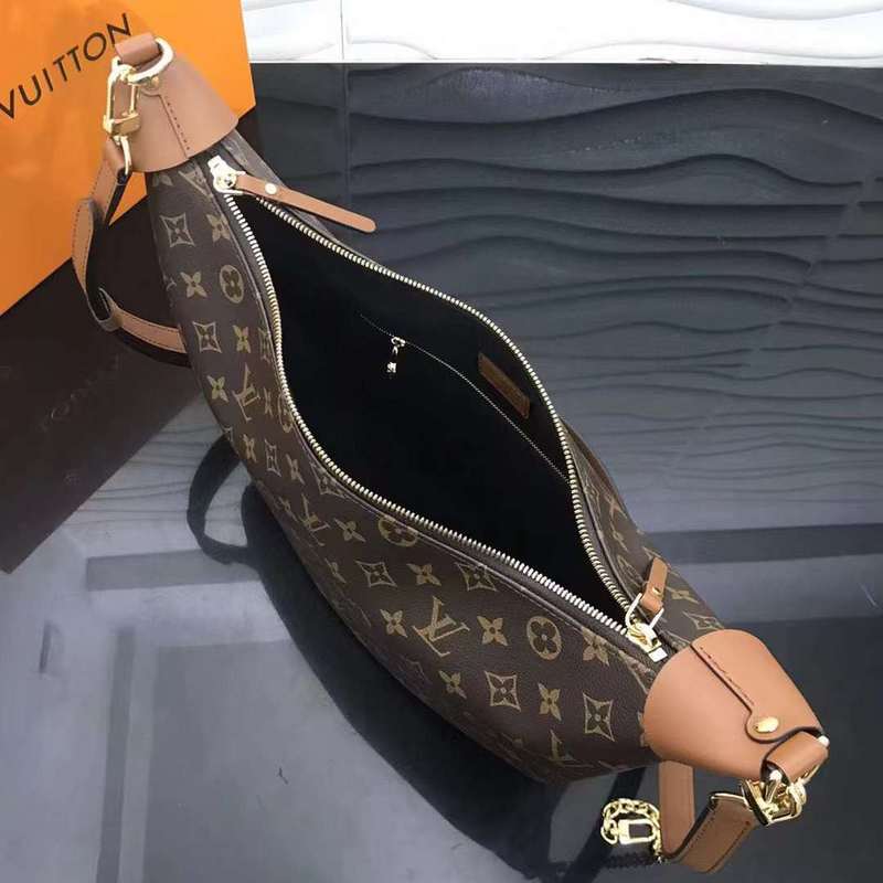Side profile of modern signature women's handbag – women's designer-style accessory