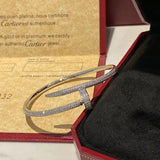 Side view of Cartier unisex jewelry piece