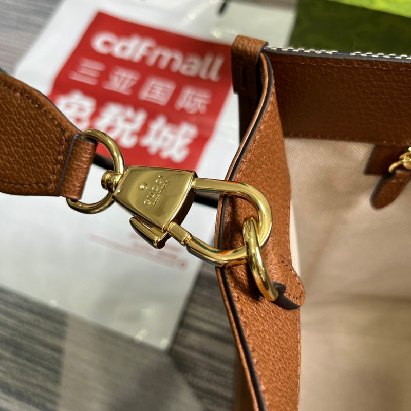Styled lifestyle shot of signature statement women's handbag – women's designer-style accessory