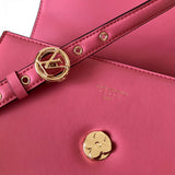 Handle and strap detail of modern statement women's handbag – women's statement bag