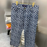 Close-up detail shot of Louis Vuitton luxury clothing with everyday silhouette