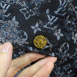 Front view of Louis Vuitton luxury clothing with label-forward styling