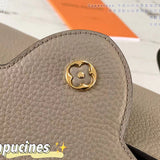 Handle and strap detail of signature elevated women's handbag – women's everyday handbag
