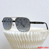 Close-up detail view of Louis Vuitton unisex sunglasses