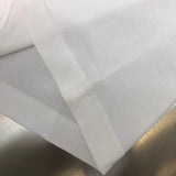 Flat lay presentation of Louis Vuitton cotton t-shirt with label-forward styling
