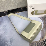 Styled lifestyle shot of refined elevated women's handbag – women's luxury handbag