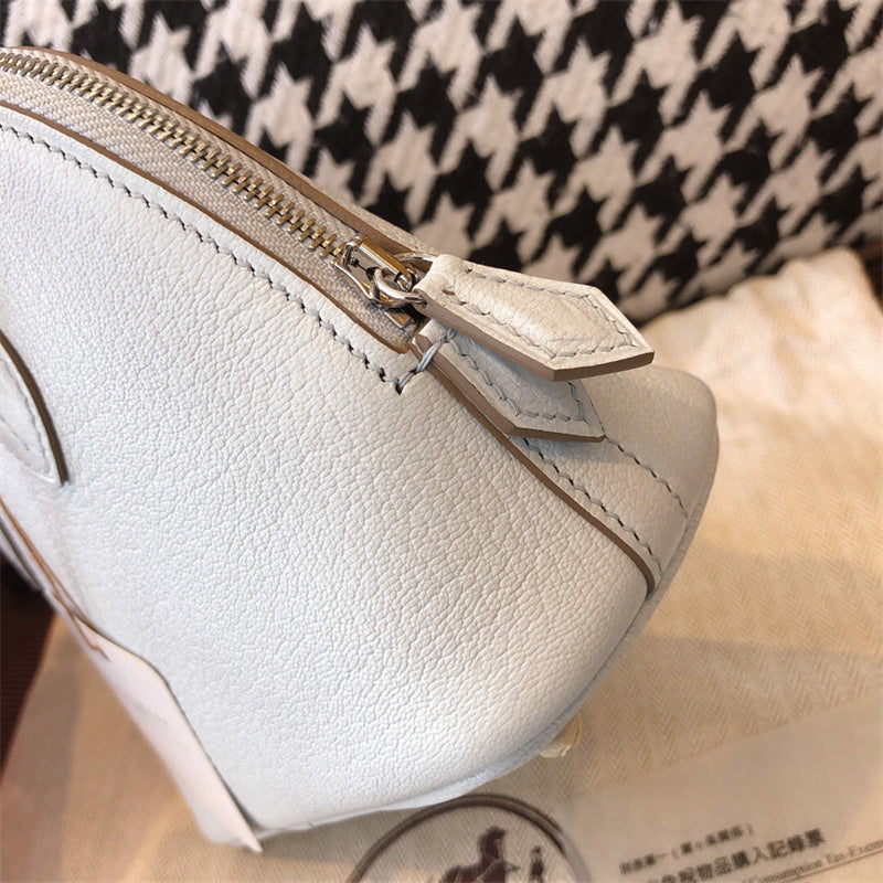 Side view of clean-lined structured handbag