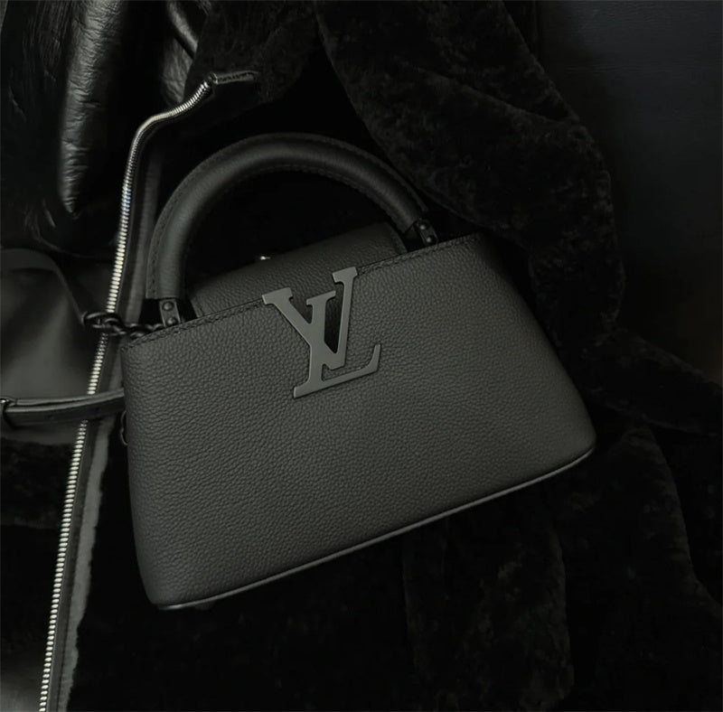  streamlined shoulder bag detail view showing craftsmanship 32