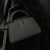  streamlined shoulder bag detail view showing craftsmanship 32