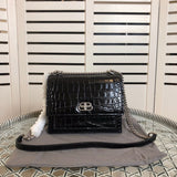 Side profile of chic polished women's handbag – women's everyday handbag
