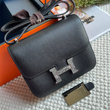 Side view of streamlined structured handbag