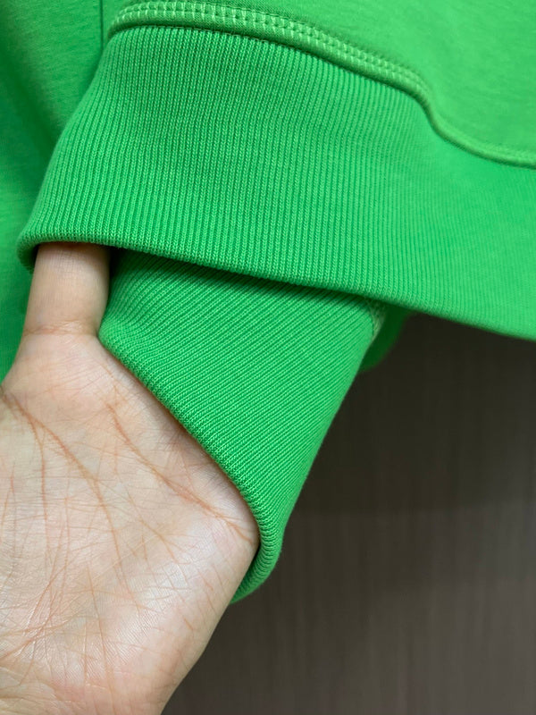 Close-up detail shot of Louis Vuitton luxury clothing with logo-detail design