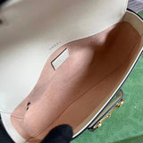 Side view of graceful structured handbag