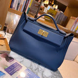 Side view of timeless structured handbag