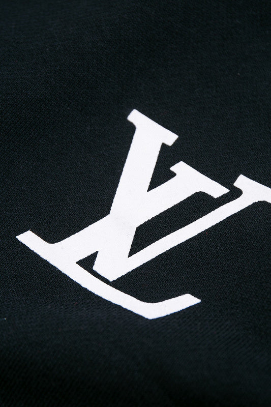 Back view of Louis Vuitton luxury clothing with label-forward styling