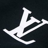 Back view of Louis Vuitton luxury clothing with label-forward styling