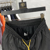 Back view of Rhude luxury clothing with label-forward styling