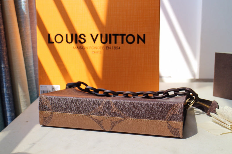 Side profile of signature premium women's handbag – women's luxury handbag