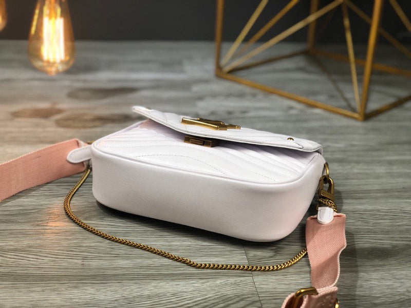 Styled lifestyle shot of sleek chic women's handbag – women's luxury accessory