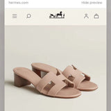 Hermes sandals Style 060 - close-up of statement logo accent