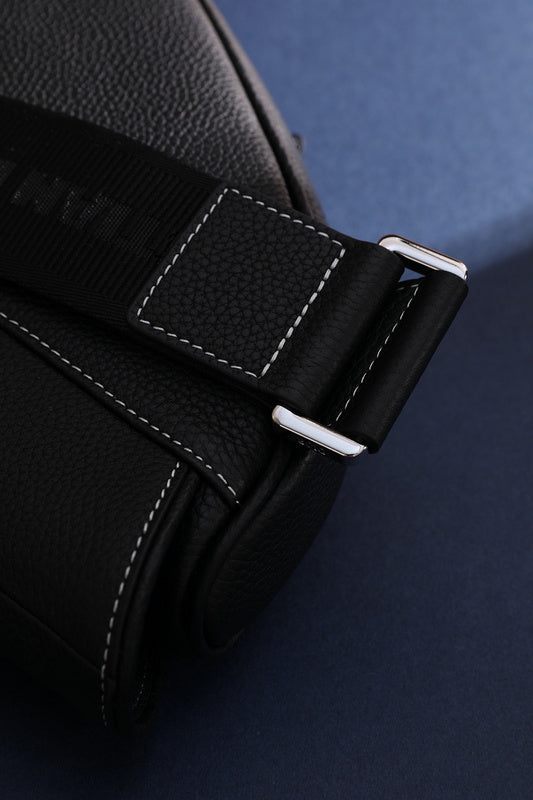 Handle and strap detail of refined structured women's handbag – women's statement bag