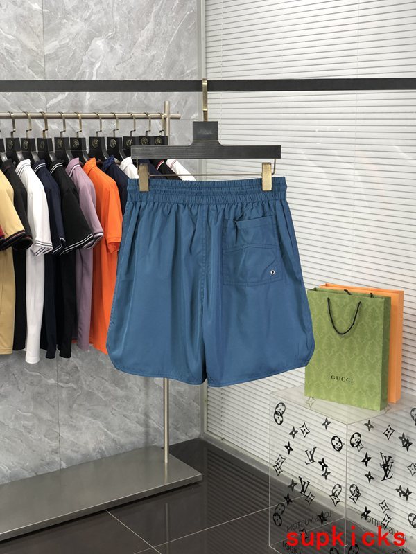 Side profile of Rhude luxury clothing with label-forward styling