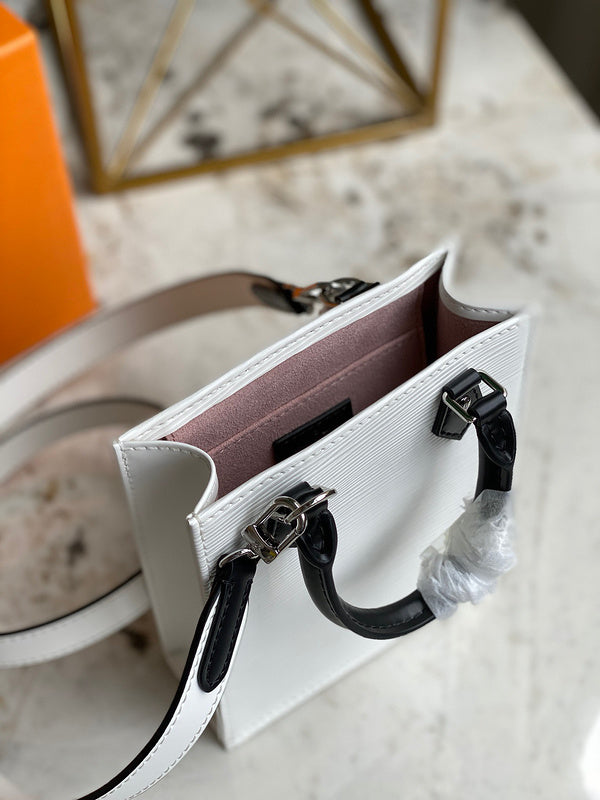 Top view of classic refined women's handbag – women's luxury accessory