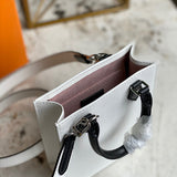 Top view of classic refined women's handbag – women's luxury accessory