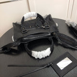 Styled lifestyle shot of elevated classic women's handbag – women's designer-style accessory